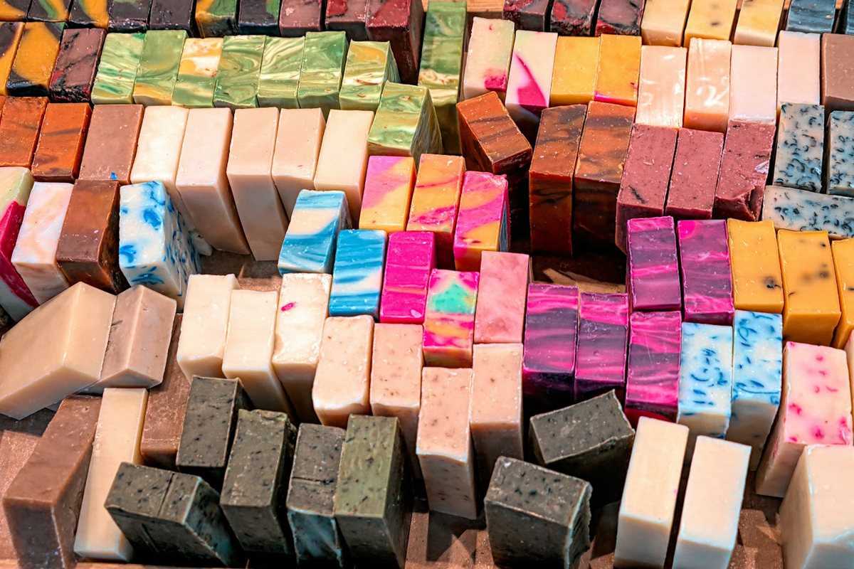 Colourful handmade soap bars stacked for sale