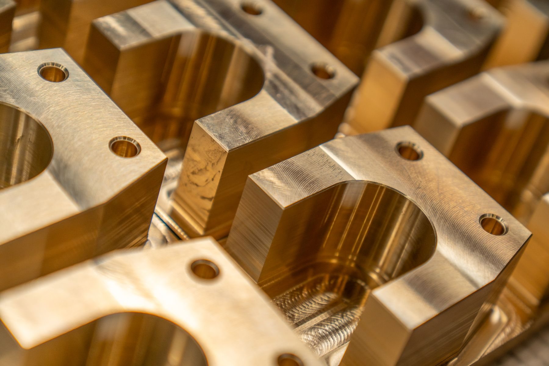 Precision-machined parts with multiple machined faces.